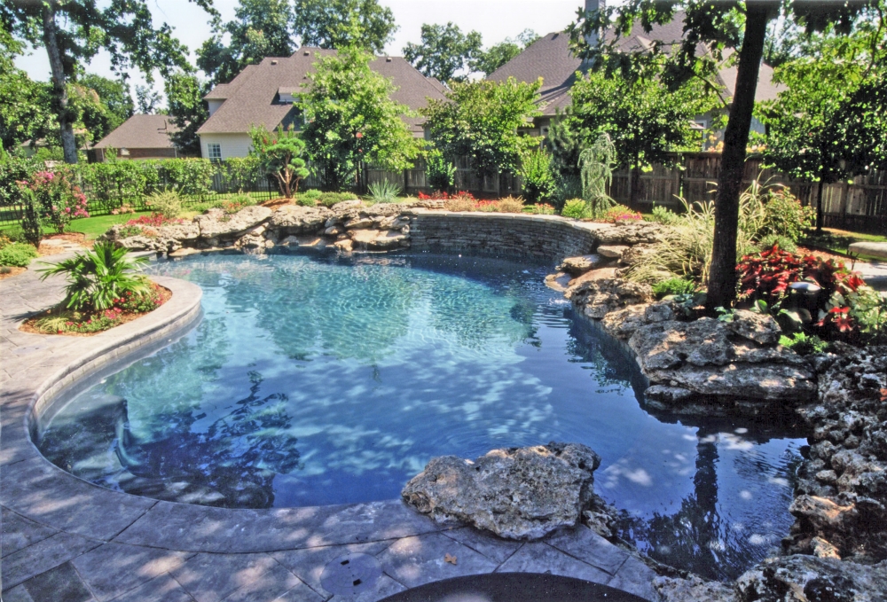 Free-form pools by Atlantis Pools & Spas Inc, Tulsa, Ok.