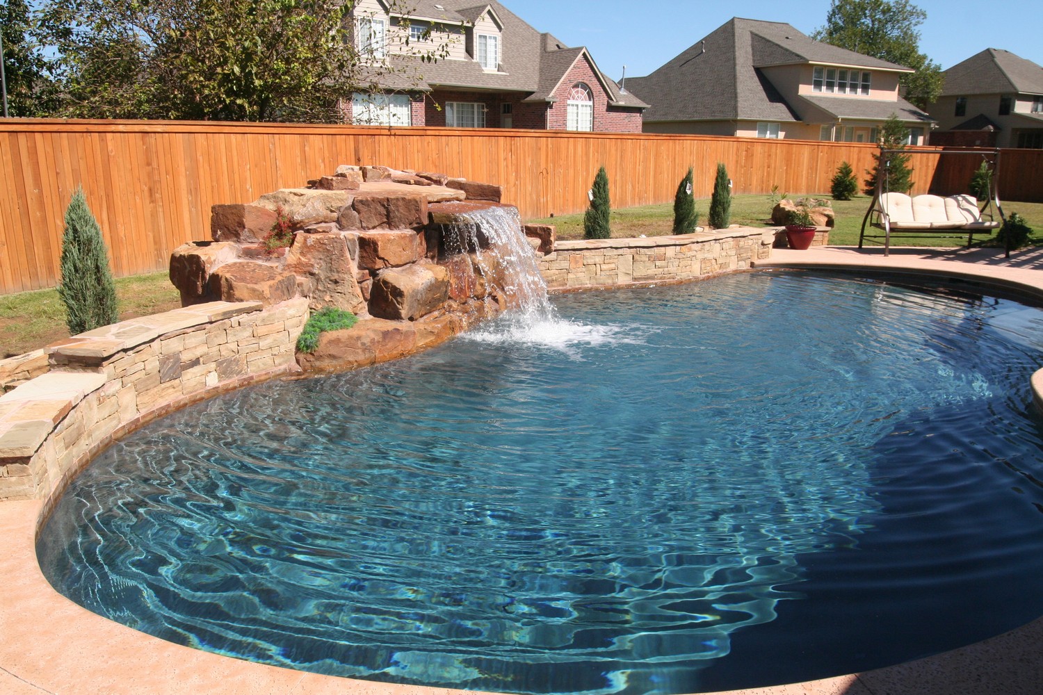 Free-form pools by Atlantis Pools & Spas Inc, Tulsa, Ok.