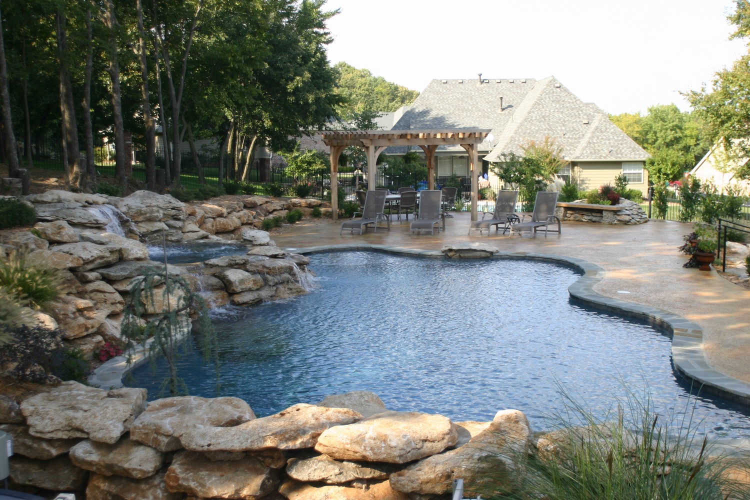 Free-form pools by Atlantis Pools & Spas Inc, Tulsa, Ok.